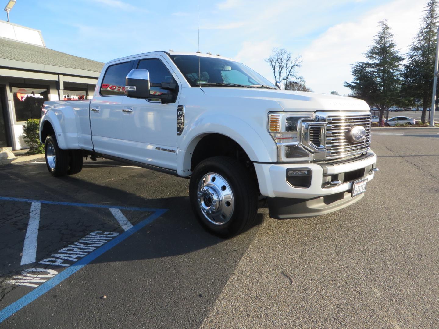 2020 White /BLACK Ford F-450 SD PlatinumCrew Cab DRW 4WD (1FT8W4DT4LE) with an 6.7L V8 OHV 16V DIESEL engine, 6A transmission, located at 2630 Grass Valley Highway, Auburn, CA, 95603, (530) 508-5100, 38.937893, -121.095482 - Must see F450 with a tool box refueling station, window tint, and a center console vault. - Photo#2